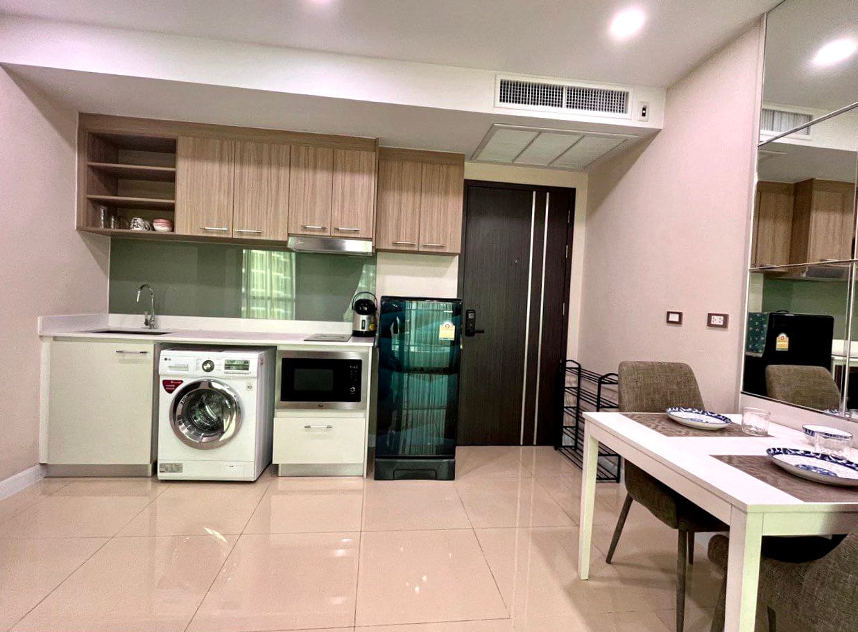 Dusit Grand Condo View — 1BR